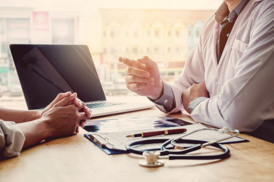 Laguna beach STD Clinic doctor talking to patient