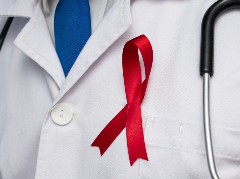 doctor with std awareness ribon