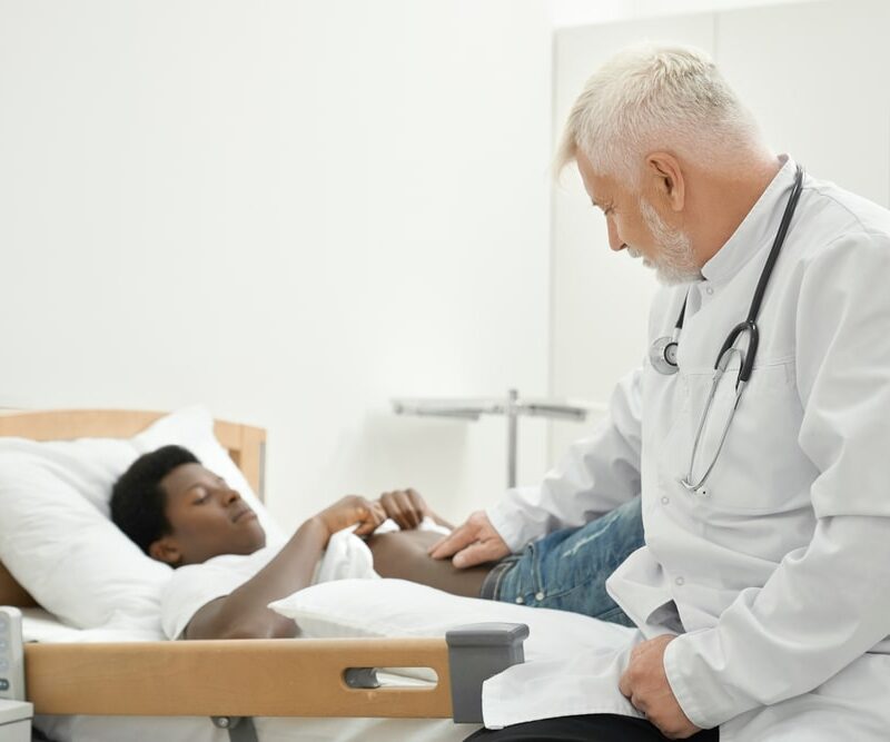 Doctor Examining Patient