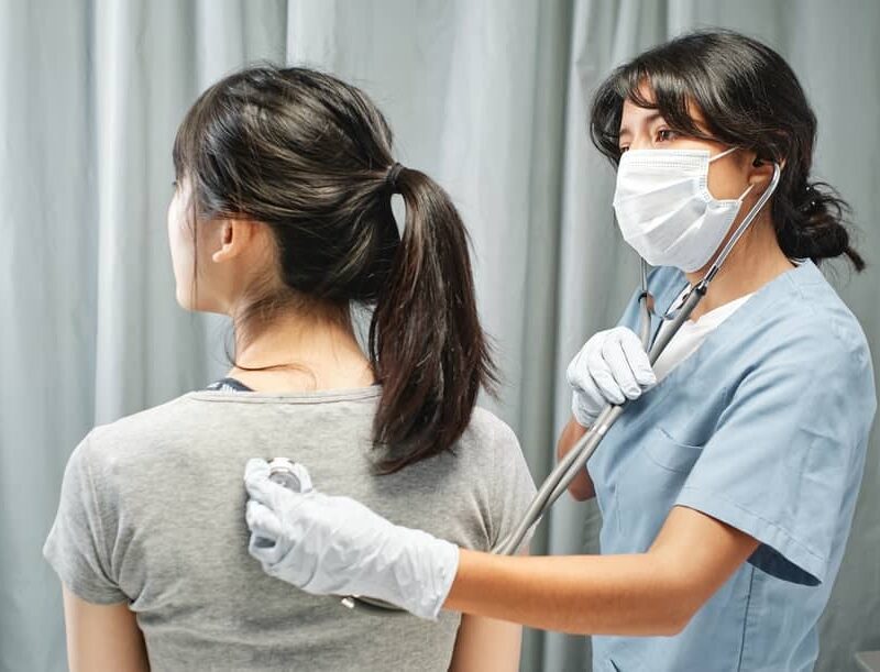 Medical Specialist Performing Physical Examination