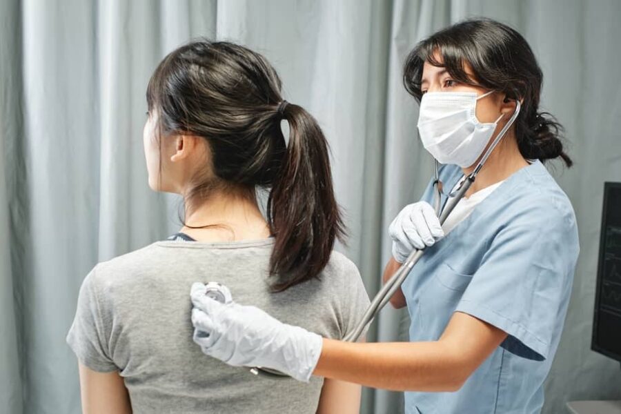 Medical Specialist Performing Physical Examination