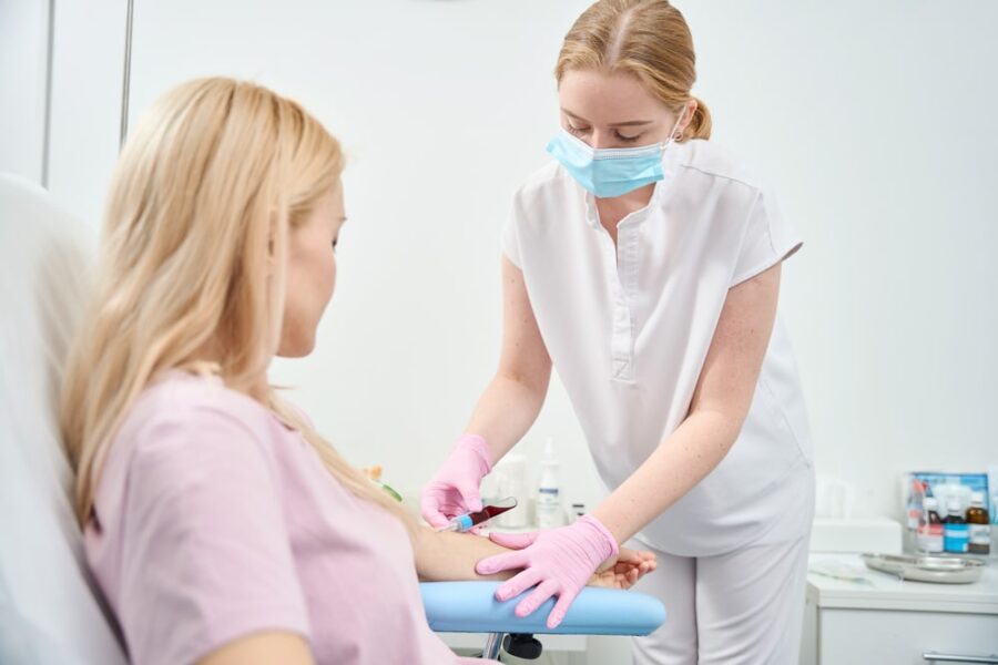 woman getting blood work done