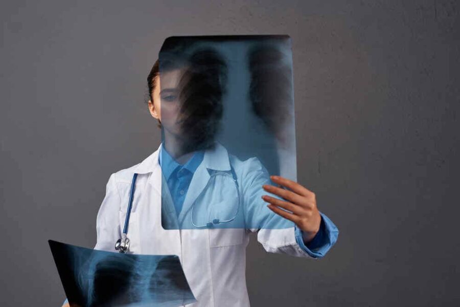 Female Doctor Examining X-Ray